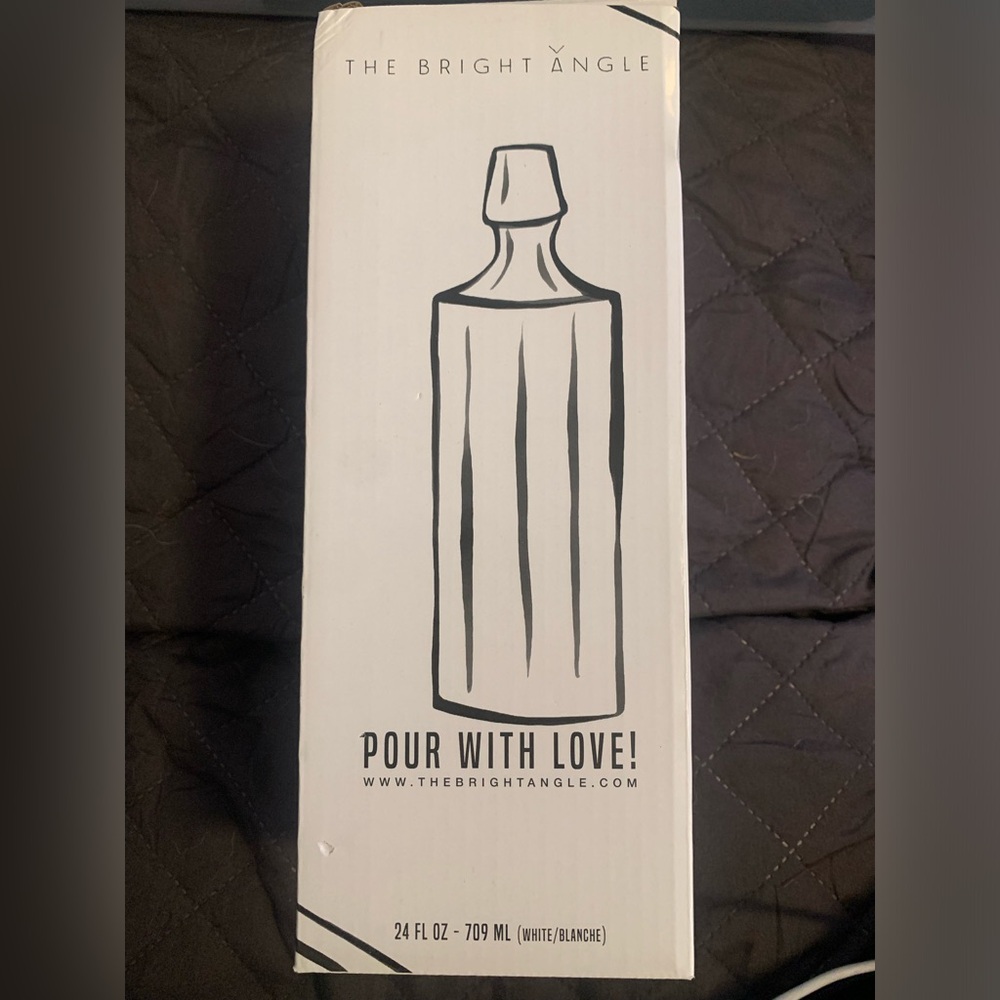The Bright Angle Pour With Love Elixir bottle